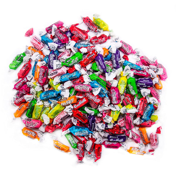 A mix of various Tootsie Frooties candy pieces in different flavors, each individually wrapped, displayed on a white background.